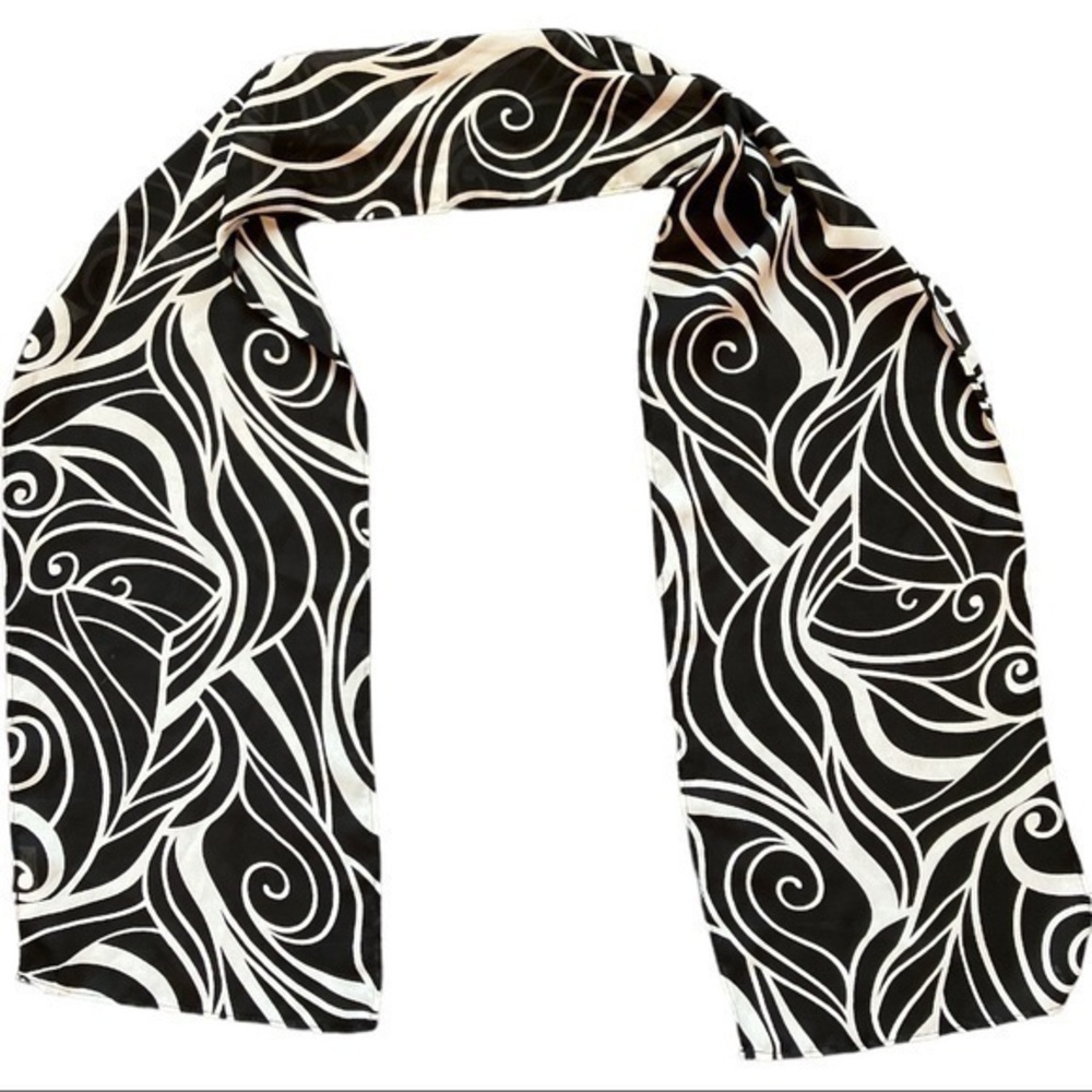 Elegant design black and white mesh scarf Approximate measurements
8” X 53.5”